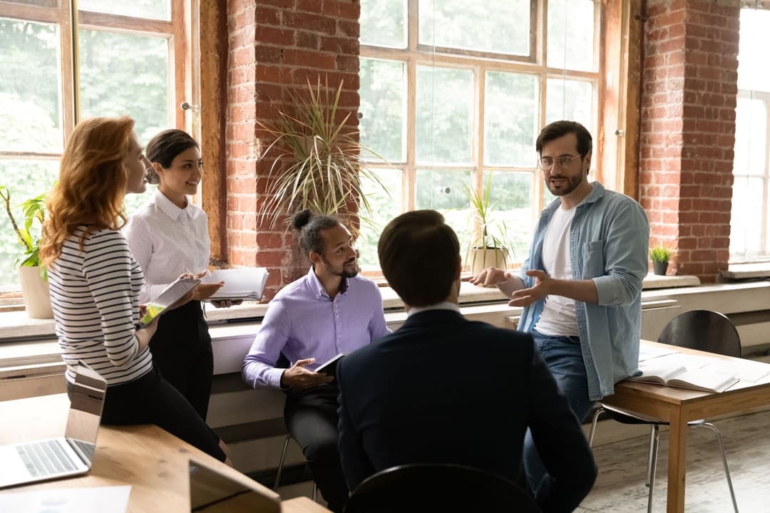 Brokers discussing the benefits of the curative health plan