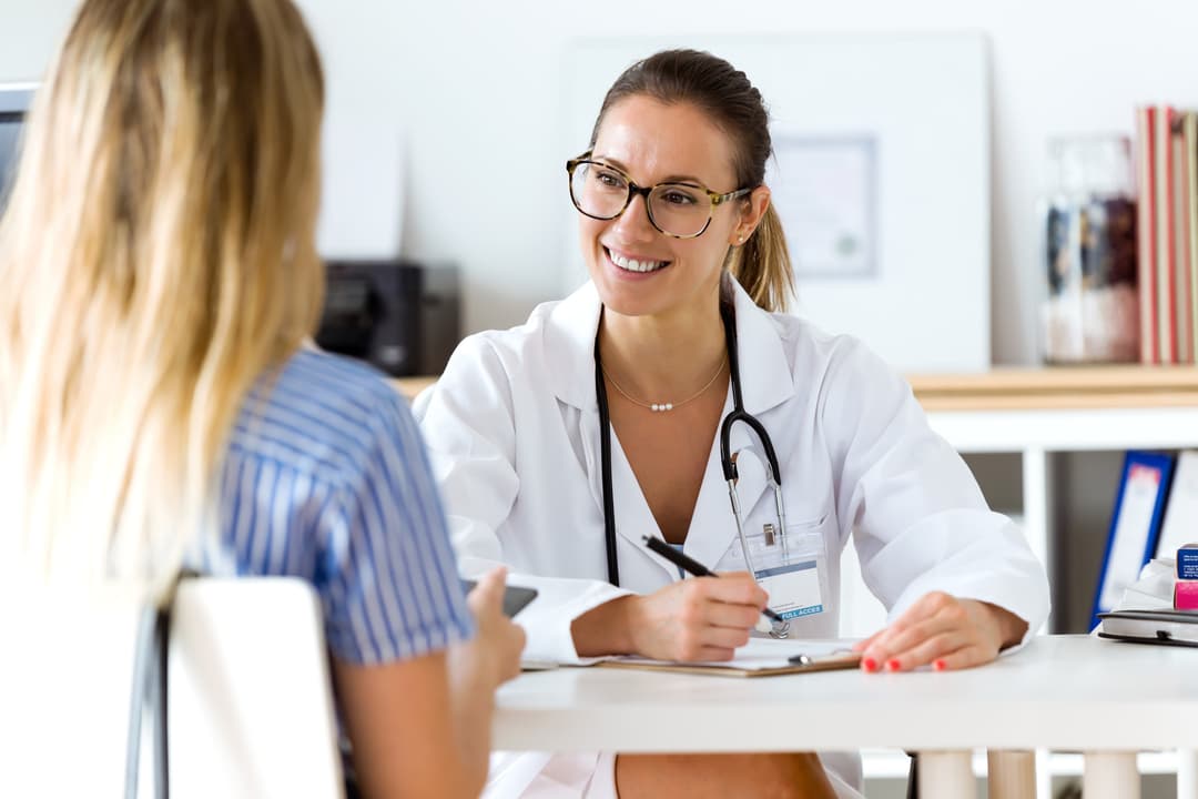 Female doctor explaining diagnosis to her patient