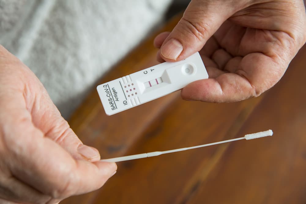 Close up positive test result in hands