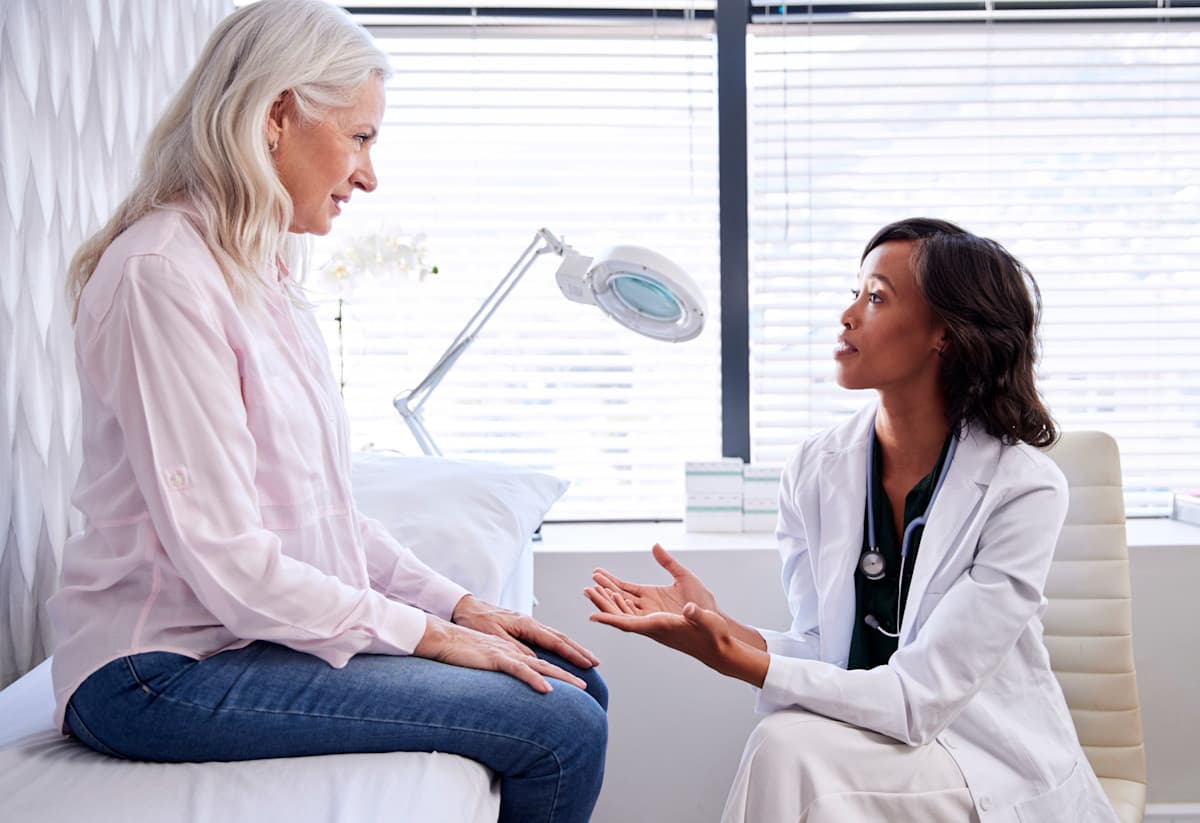 Member chatting with their doctor about Cologuard