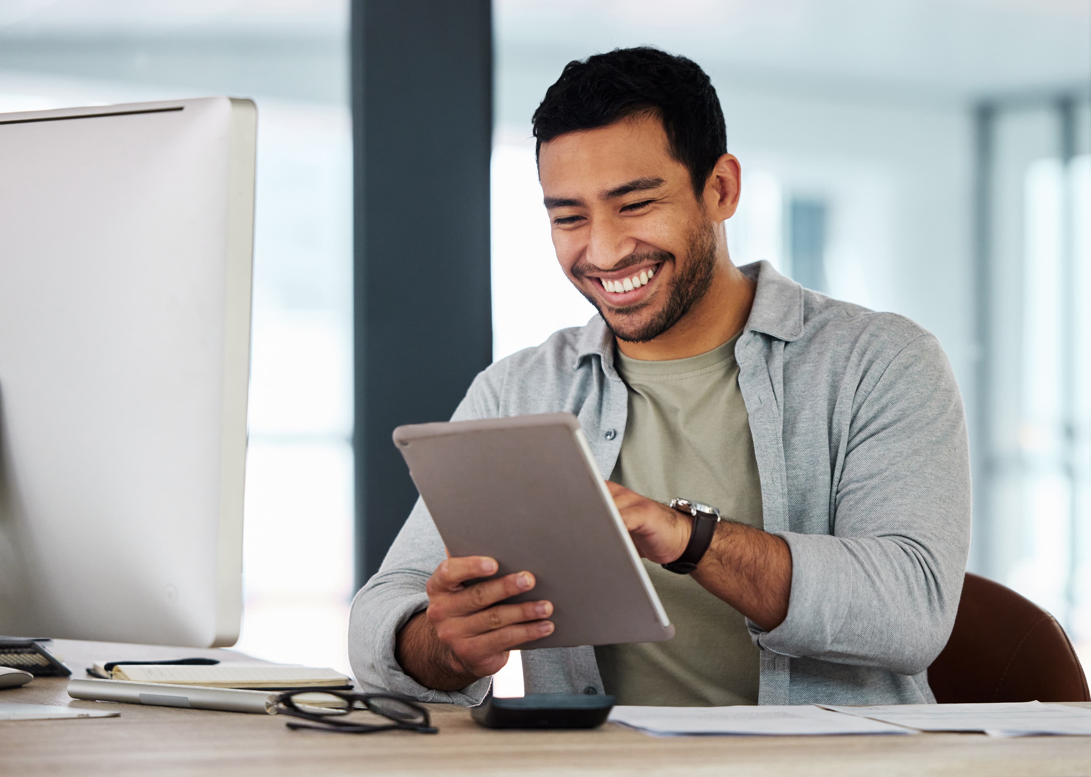 young businessman using his digital tablet