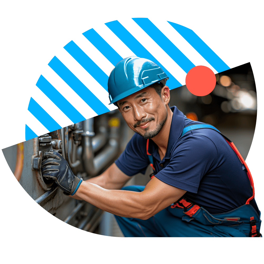 Employee fixing part and smiling
