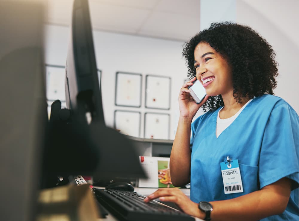 Healthcare front desk employee scheduling patient visits