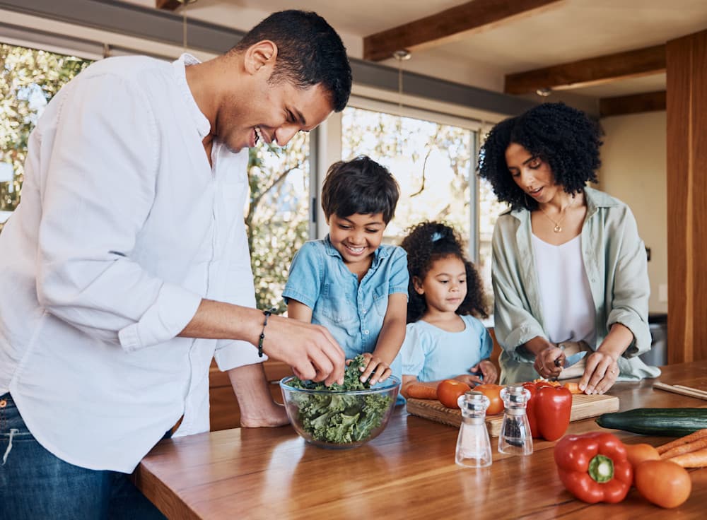 family cooking healthy dinner together